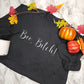 Black sweatshirt/crewneck with white boo bitch lettering.