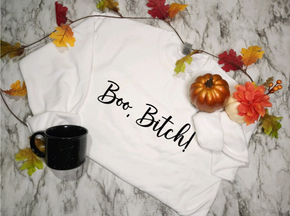 White sweatshirt/crewneck with black boo bitch lettering.